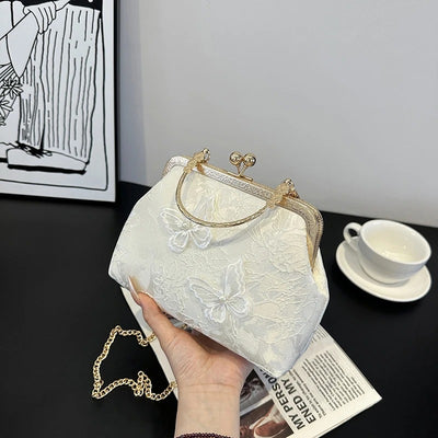 Belle Clutch™